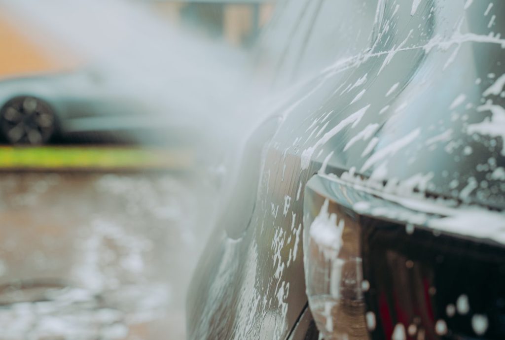 Vehicle with water being sprayed onto it