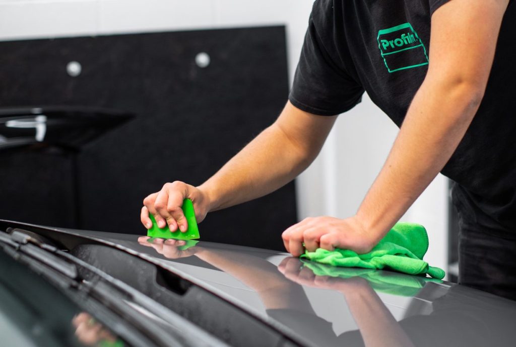 Placing film on a car